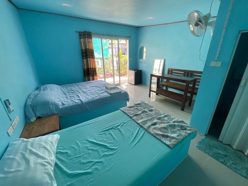 The Pier Homestay Thongsala Phòng bức ảnh